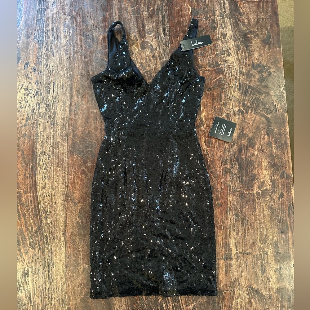 New with tags. Lulus black sequined dress